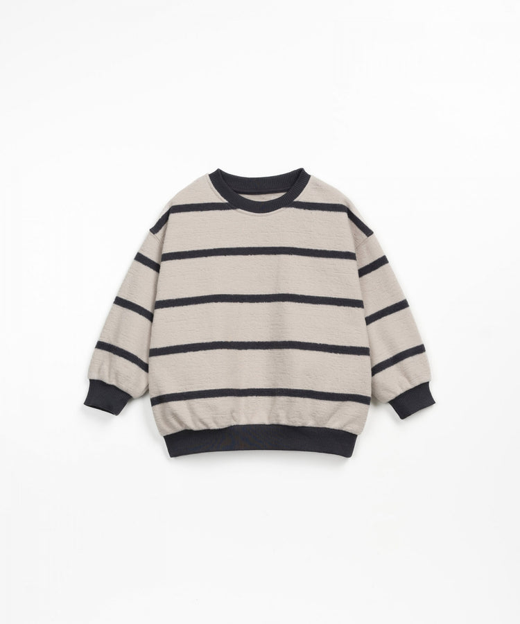 Striped knitted jumper with cuffs