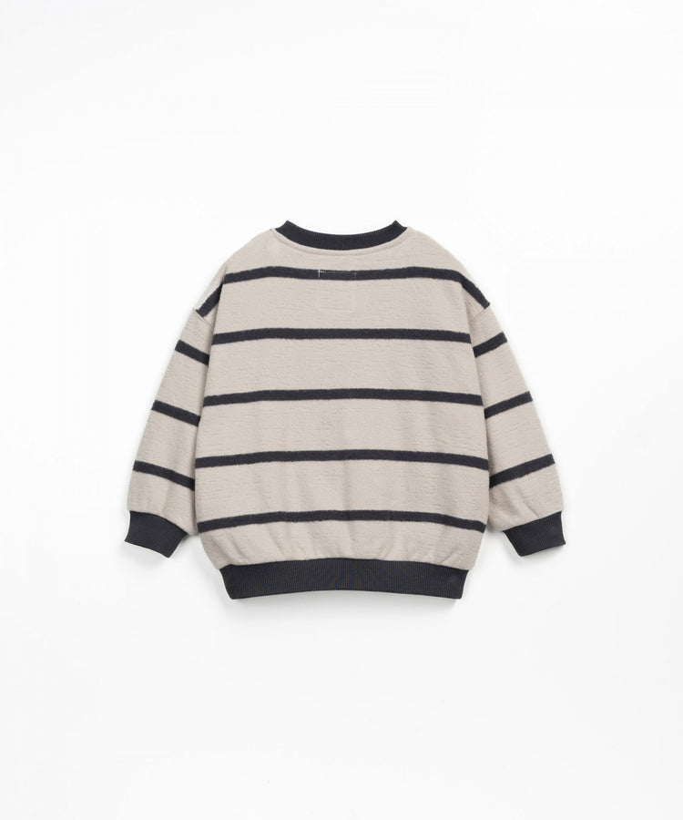 Striped knitted jumper with cuffs