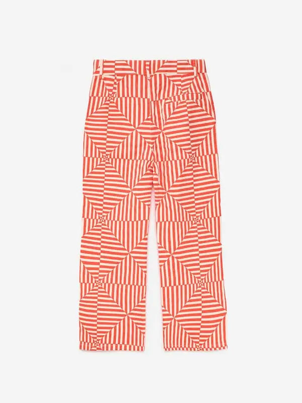 Vista atras de pantalones blancos con estampado de rombos de color rojo para niñas y niños de True Artist.