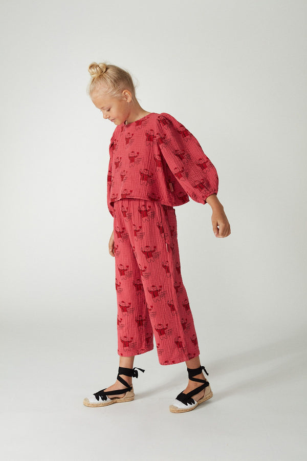 Pantalones rojos con estampado de gatos Weekend House Kids