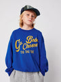Niño con sudadera azul Go Bobo Choese de la colección Tic Tac Toe moda infantil española.