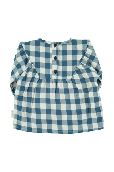 Vista atras de blusa de cuadros blancos y azules para niñas de Piupiuchick.
