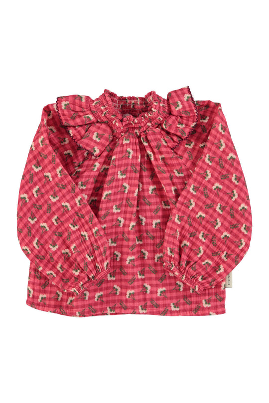 Blusa rosa de cuadros con estampado de flores para niñas de Piupiuchick para otoño invierno 2025.