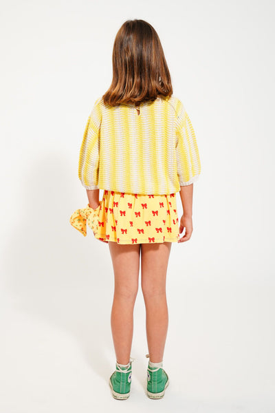 Falda corta | amarillo con lazos rojos Piupiuchick
