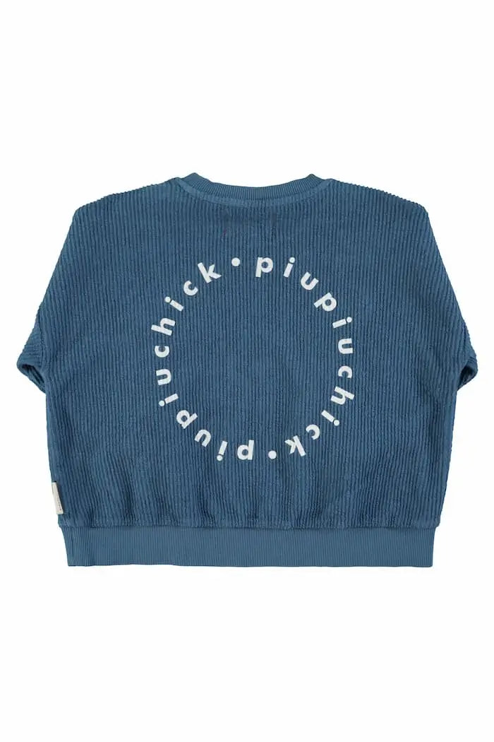 Vista trasera de sudadera azul con logo en la espalda para niñas y niños de Piuiuchick.