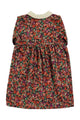 Vista atras de vestido largo multicolor de flores con cuello Peter Pan de Piupiuchick.