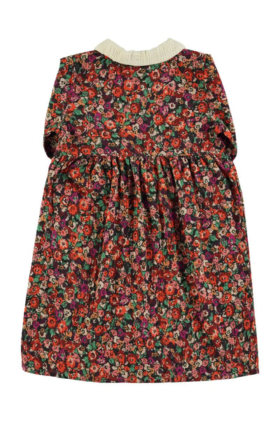Vista atras de vestido largo multicolor de flores con cuello Peter Pan de Piupiuchick.