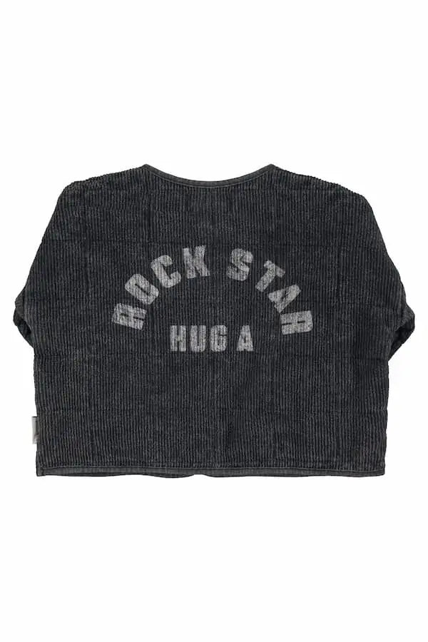 Chaqueta negra con texto "Hug a rock star" en la espalda, vista trasera,moda sostenible Piupiuchick.