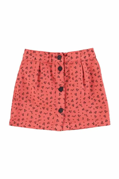 Falda corta de color rosa con estampado de flores negros para niñas de Piupiucick.