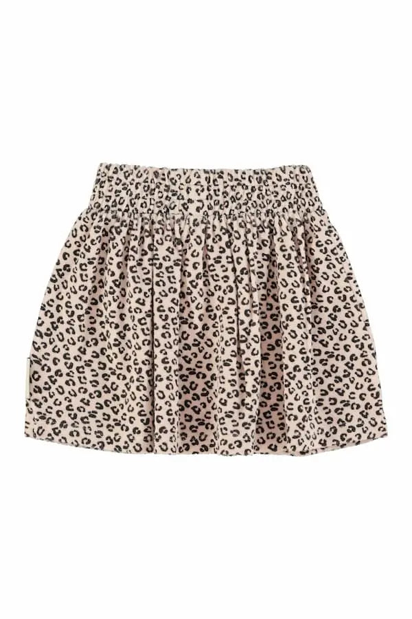 Vista atrás de falda corta rosa con estampado de animal print de Piupiuchick.