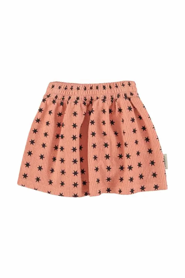 Falda corta rosa con estampado de estrellas negras, vista atras, Piupiuchick aw25 moda ecologica para niñas