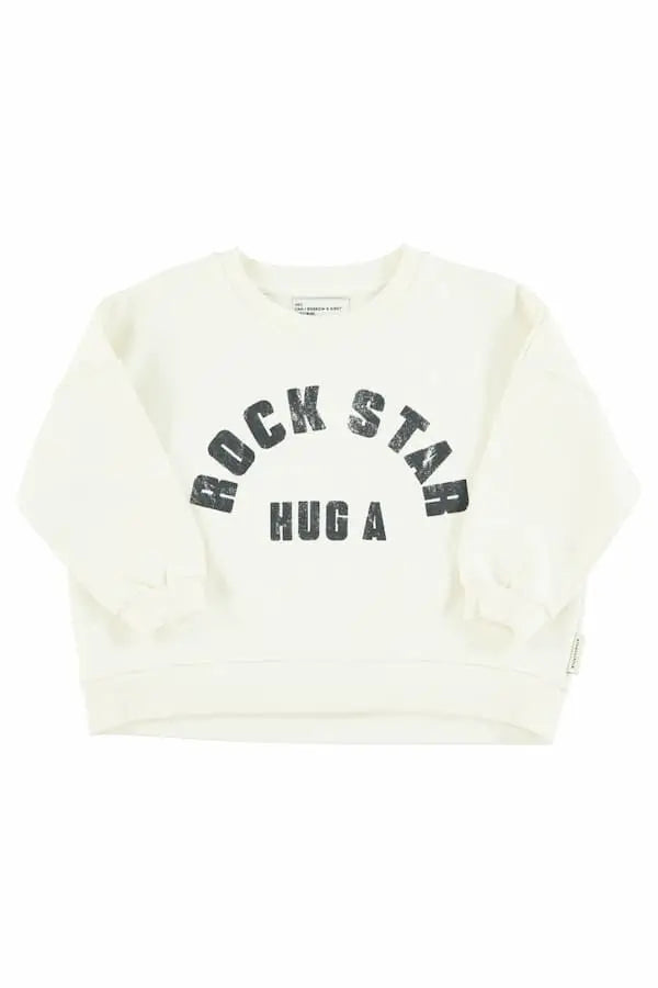 Sudadera  unisex de color crudo con texto "Hug a rock star" en negro e la parte delantera de Piupiuchick.