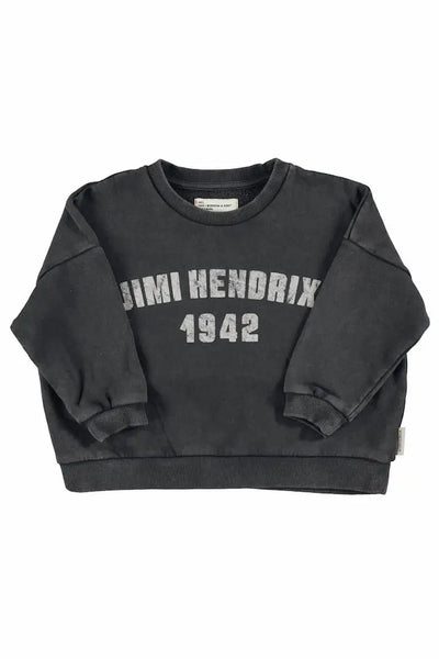 Sudadera de color negro lavado con texto "Jimi Hendrix 1942" en la parte delantera de Piupiuchick.