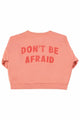 Sudadera rosa, vista trasera, con texto "Don´t be afraid" dec Piupiuchick para niñas.