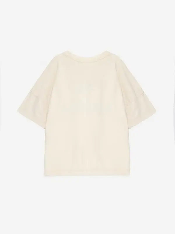 Camiseta de manga corta de color crudo de True Artost, vista atrás.