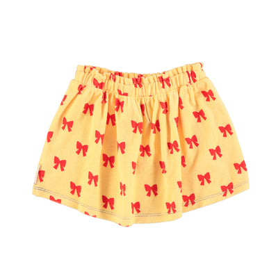 Falda corta | amarillo con lazos rojos Piupiuchick